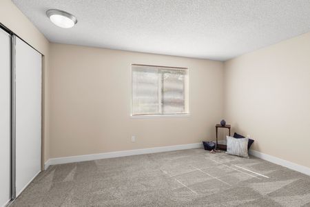 Vacant Bedroom with carpet