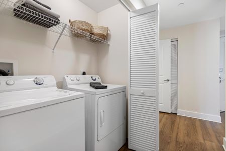 In-unit washer and dryer inside a luxury apartment in Boca Raton FL.