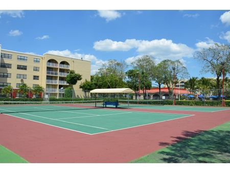 Country Club Towers, exterior, tennis courts, trees