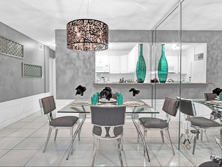 Model Unit 128 - Large Dining Area with Mirrored Walls