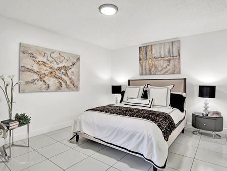 Model Unit 128 - Bedroom with Tile Floors