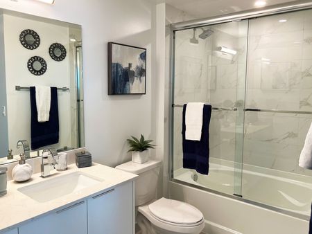 Frameless Glass Shower Enclosures and Deep Soaking Tubs