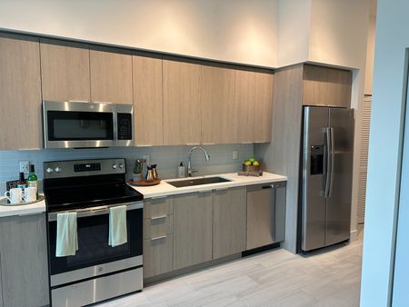 Studio Kitchen with Stainless Steel Appliances
