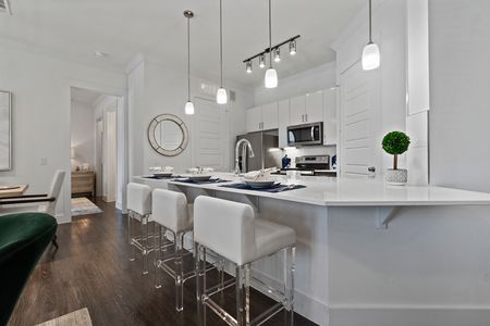 Kitchen with Breakfast Bar | The Luxe at Mercer Crossing | Apartments In Farmers Branch