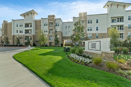 Landscaping, sign The Luxe at Mercer Crossing | Apartments Near Farmers Branch