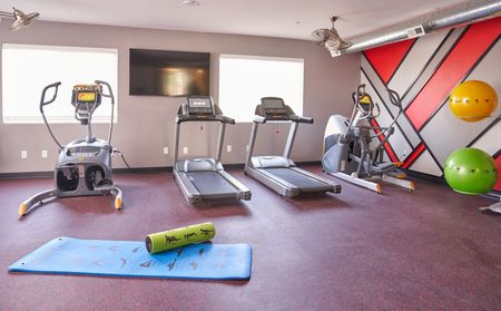 VUE | Fitness Center with exercise equipment and yoga mat | Amenities at Vue apartments in Des Moines, IA