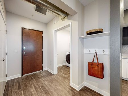 Entry, laundry area in apartment at  LINC at Gray's Station
