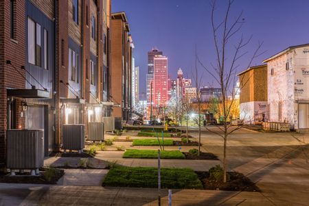 Nightime view of landscaping doors Apartments in Des Moines, Iowa | 5Fifty5