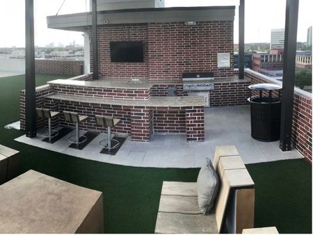 Grilling area on rooftop lounge at Tinsley on the Park | Luxury Apartments Houston