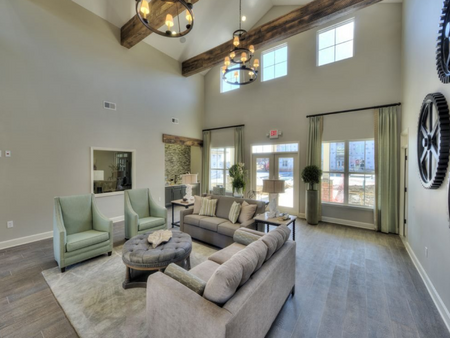 Clubhouse seating area with high, vaulted ceilings.