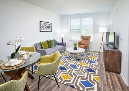 Image of Living Room and Dining Room | Ovation at Arrowbrook | Affordable Herndon VA Apartments