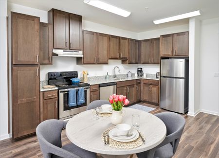 Image of Dining Area and Kitchen | Ovation at Arrowbrook | Affordable Herndon VA Apartments