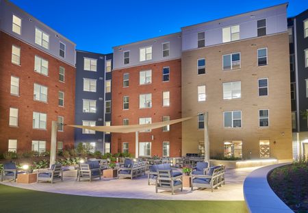 Nighttime Image of the Courtyard | Ovation at Arrowbrook | Affordable Herndon VA Apartments