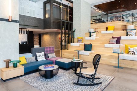 Grab a Package From the Concierge, Relax or Work in The Nats Park Stadium-Inspired Seating in the Phase I Lobby | Meridian on First | Navy Yard Apartments | Washington DC Apartments
