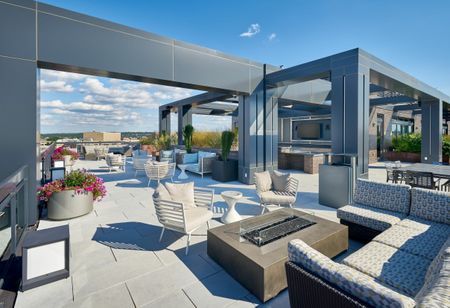 Huddle Around a Fire Pit With Friends or Catch a Game on TV on the Rooftop | Meridian on First | Navy Yard Apartments | Washington DC Apartments