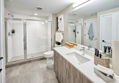Modern Bathrooms With Quartz Countertops, Ceramic Tile Surrounds and Flooring, and Select With Oversized Showers | Meridian on First | Navy Yard Apartments | Washington DC Apartments