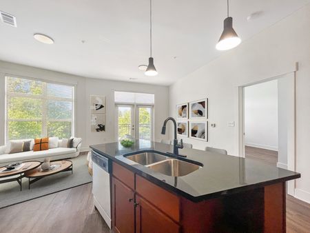 Open Plan with Kitchen island at Lofts at Weston apartments