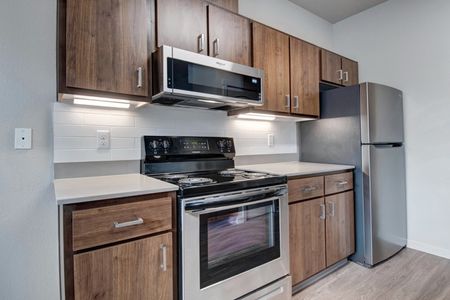 Kitchen with Stainless Steel Appliances | Apartments in Tualatin, OR | River Ridge