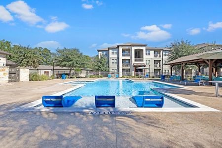 Pool of Resort Style Seating | Kyle TX Apartments for Rent | Oaks of Kyle
