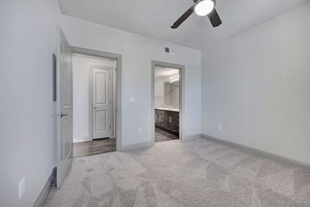 Bedroom with Ceiling Fan | Kyle TX Apartments | Oaks of Kyle