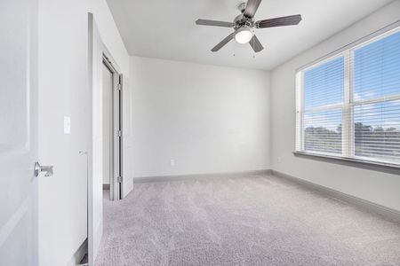 Bedroom with Ceiling Fan | Kyle TX Apartments | Oaks of Kyle