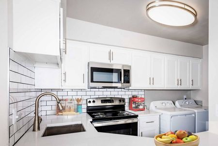 Bellevue West - White Kitchen with Stainless Steel Appliances