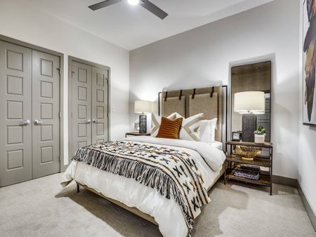 Luxury spacious bedroom at Midway Urban Village Luxury Townhomes and loft apartments in Farmers Branch, Texas near North Dallas. Luxury North Dallas Townhomes for rent