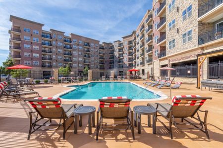 Carson Street Towers-Pool with Lounge Seating, Tables, and Umbrellas