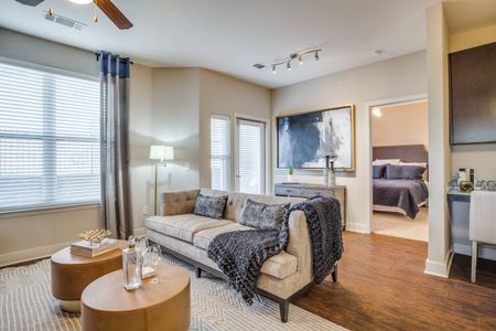 Open concept one-, two-, and three-bedroom apartment floorplans with wood style flooring