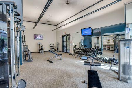 Updated Fitness Center with cardio and weight equipment