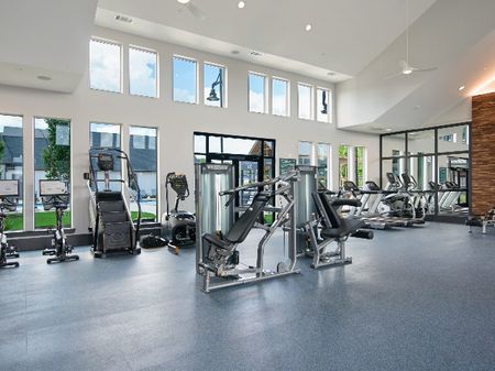 The Sound at Pennington Bend - Resident Fitness Center With Various Exercise Machines, Several Sets of Tall Windows, and Ceiling Fans