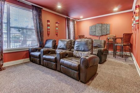 Theater Room with TV and recliners