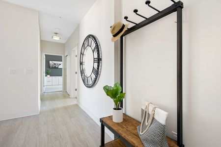 Hallway with coat stand and clock