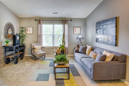 Modern spacious living area with sofa and coffee table