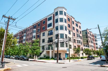 Brick Facade with Brownstone Entrances