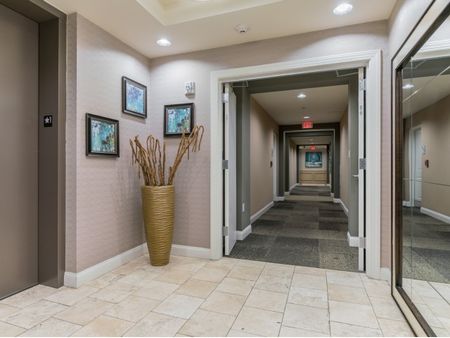 Elevators and tiled hallway  | The Rocca Apartments in Atlanta, GA