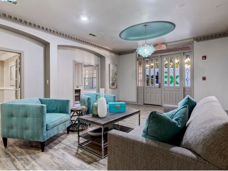 Elegant living area with couches and chairs  | The Rocca Apartments in Atlanta, GA