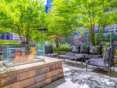 Fire pits, heat lamps, tables and chairs on the outdoor sundeck