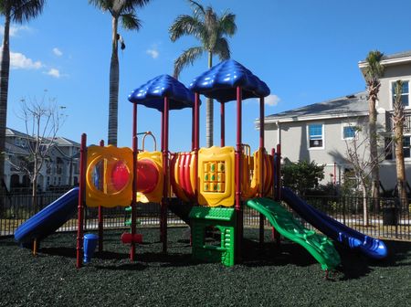 Kid’s plastic playground area with slides and tunnels