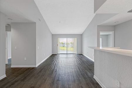 Spacious open floor plan apartment homes with wood like flooring throughout