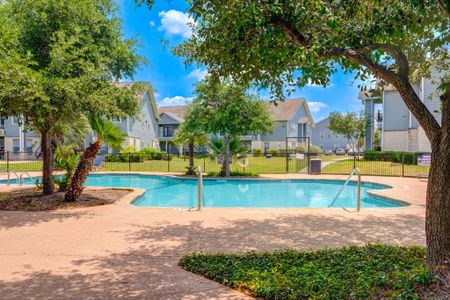 Community pool with garden courtyard view