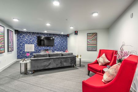 Social Lounge and Gaming Area with sofa and tv at arte apartments