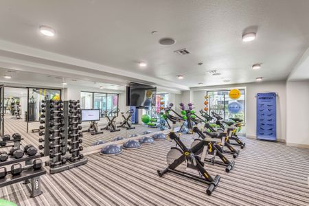 State-of-the-Art Two-Story Fitness Center with Spin/Yoga Room with Wellbeats