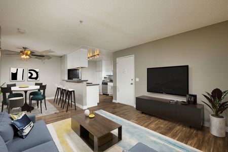 virtually staged living room in newly renovated apartment home