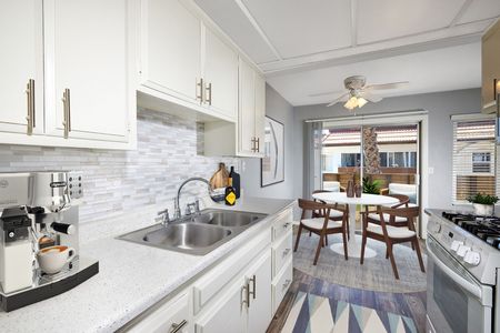 virtually staged renovated kitchen and dining room