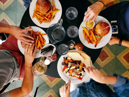 group of people eating at table