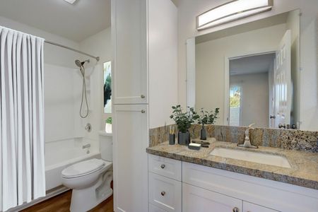 bathroom with granite countertops