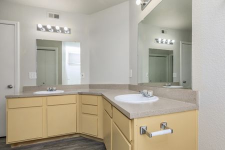 Wall to wall mirrors in bathroom