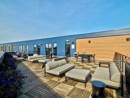 Rooftop Deck - Lounge with ample seating at West End Yards | Apartments In Portsmouth, NH for Rent
