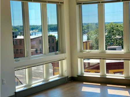 5th Floor Penthouse  - Closeup of floor-to-ceiling windows with view at The Flats at 131 | Apartments in Beverly, near Danvers, MA